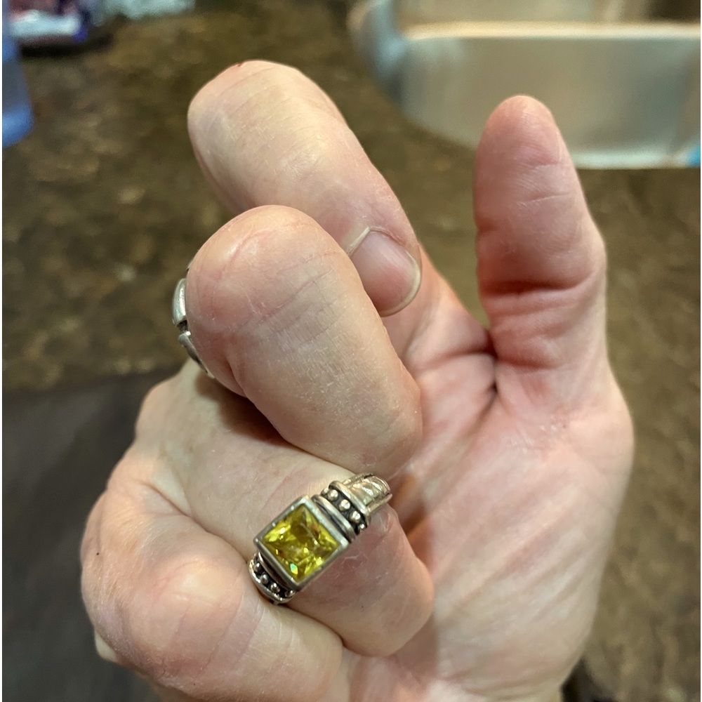 Costume jewelry. Nickel plated stone is topaz